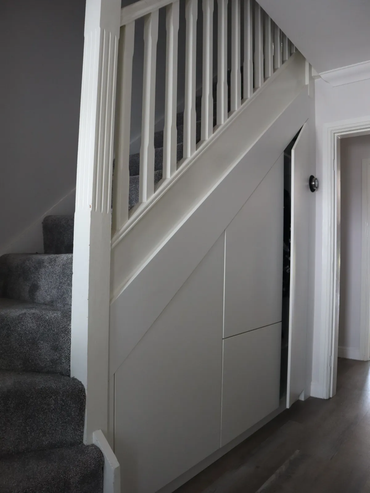 Under stairs storage by Glide and Slide