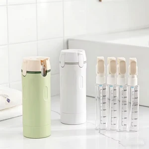 Tripstash 4-in-1 travel bottle disassembled showing four detachable inner bottles with pump heads
